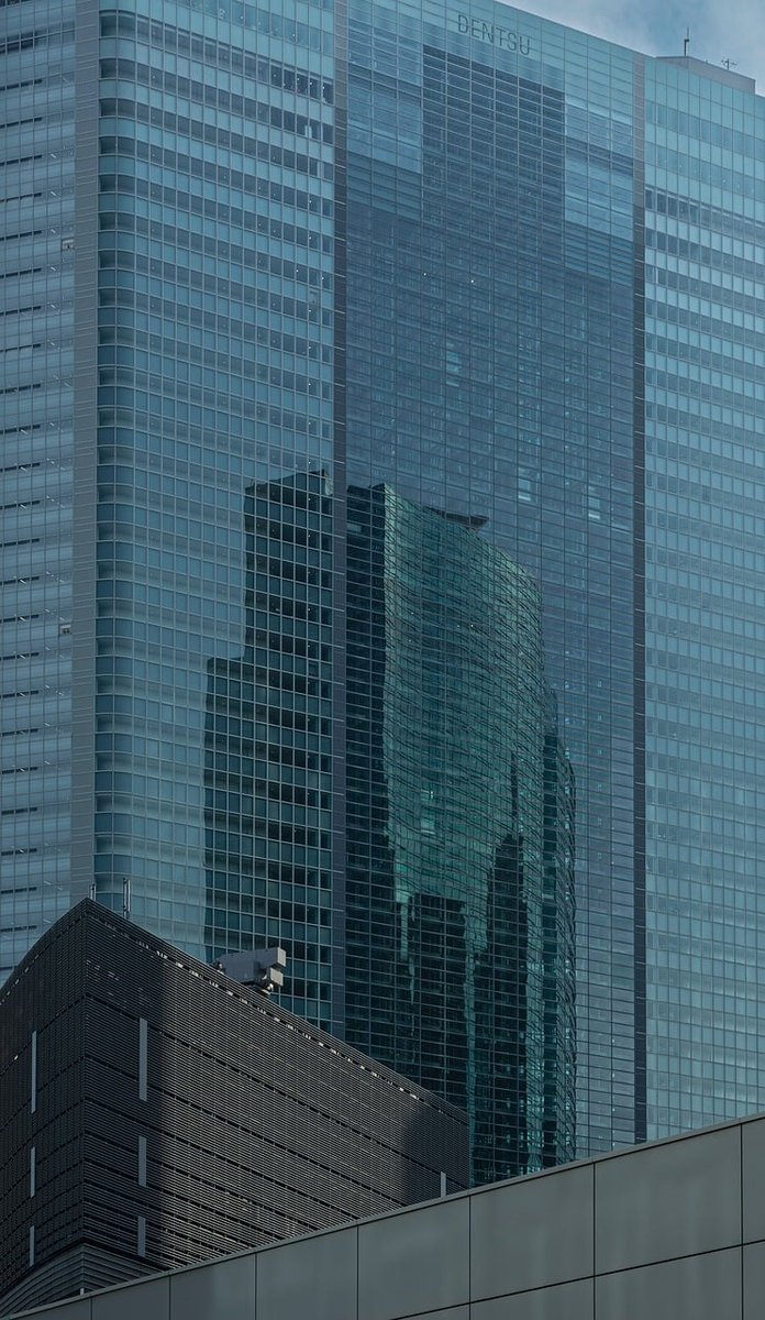 High-rise residential towers against an evening city skyline